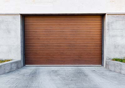 Portes de garage par un menuisier à Le Mans (72)